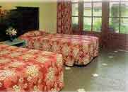 the bedroom of kuta bungalows bali